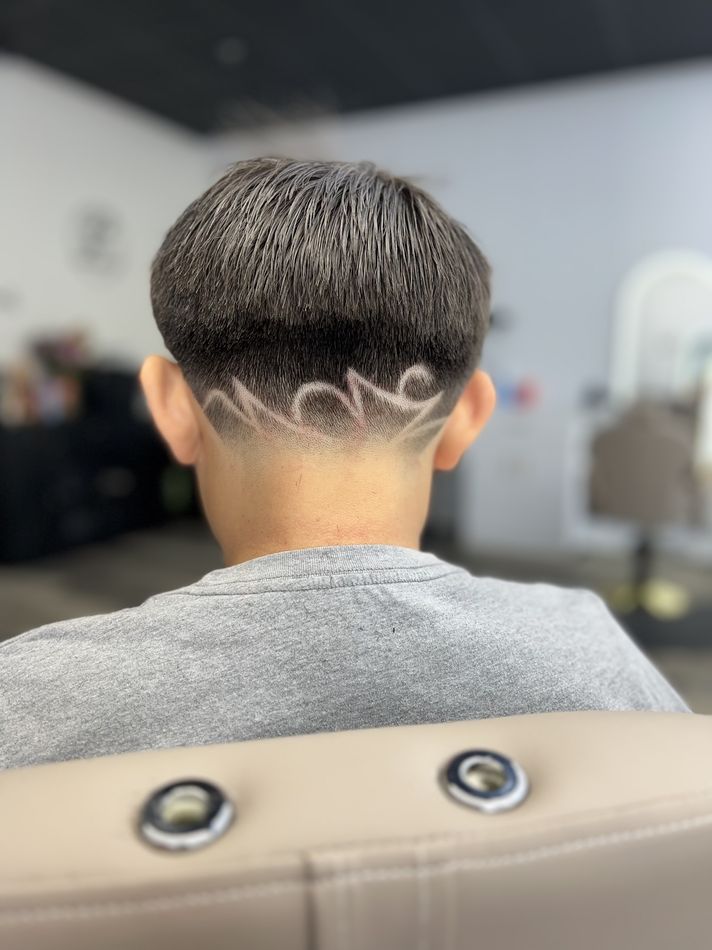 Boys haircut with custom hair design